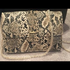 Faux snakeskin clutch